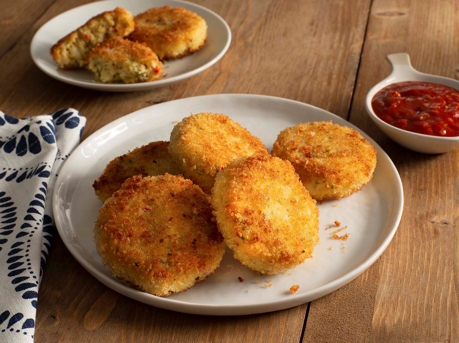 Rice and Hominy Cakes with Tomato Sauce